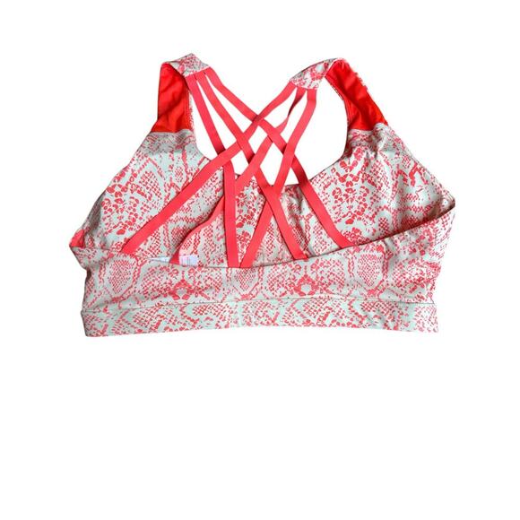 Fabletics Kessler Orange Coral Cream Strappy
Reptile Print Med Impact NWT Bra - Picture 4 of 8